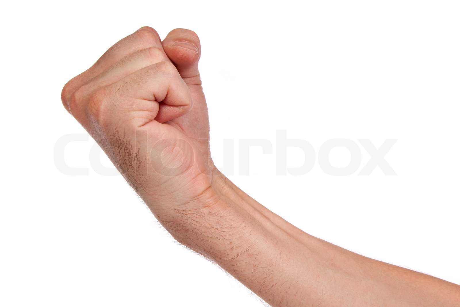Males hand with a clenched fist isolated | Stock image | Colourbox