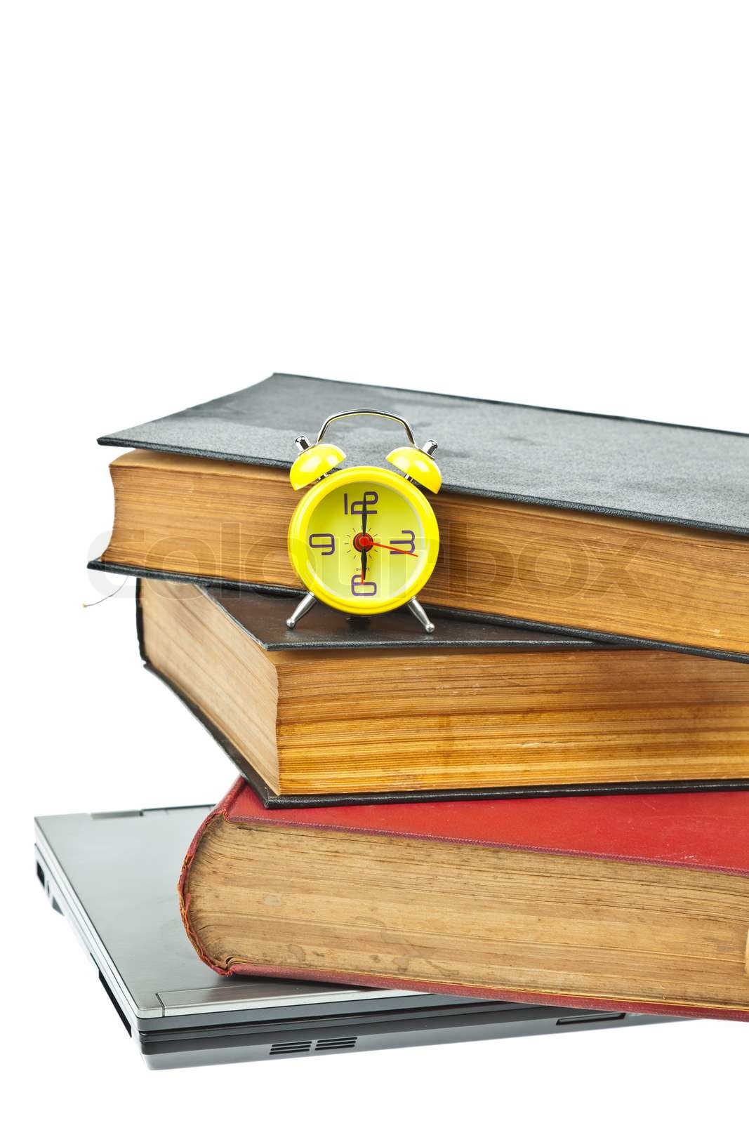 Clock auf Buch als Zeit -Management-Konzept | Stock Bild | Colourbox