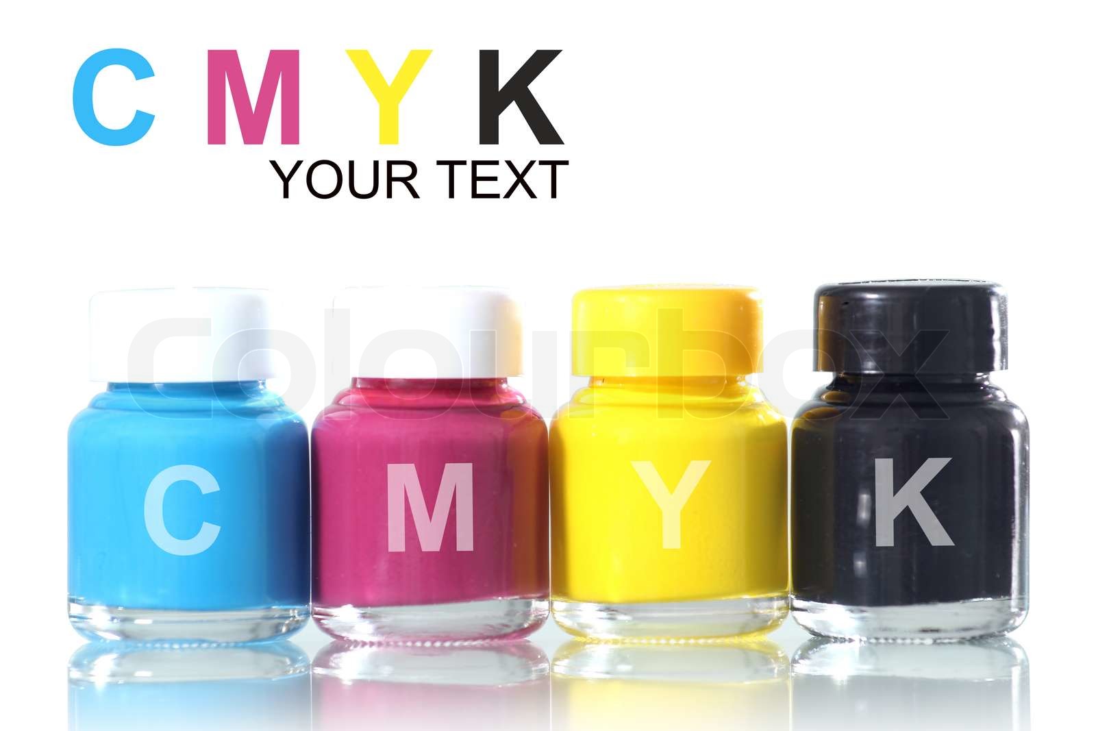 bottles of ink in cmyk colors | Stock image | Colourbox