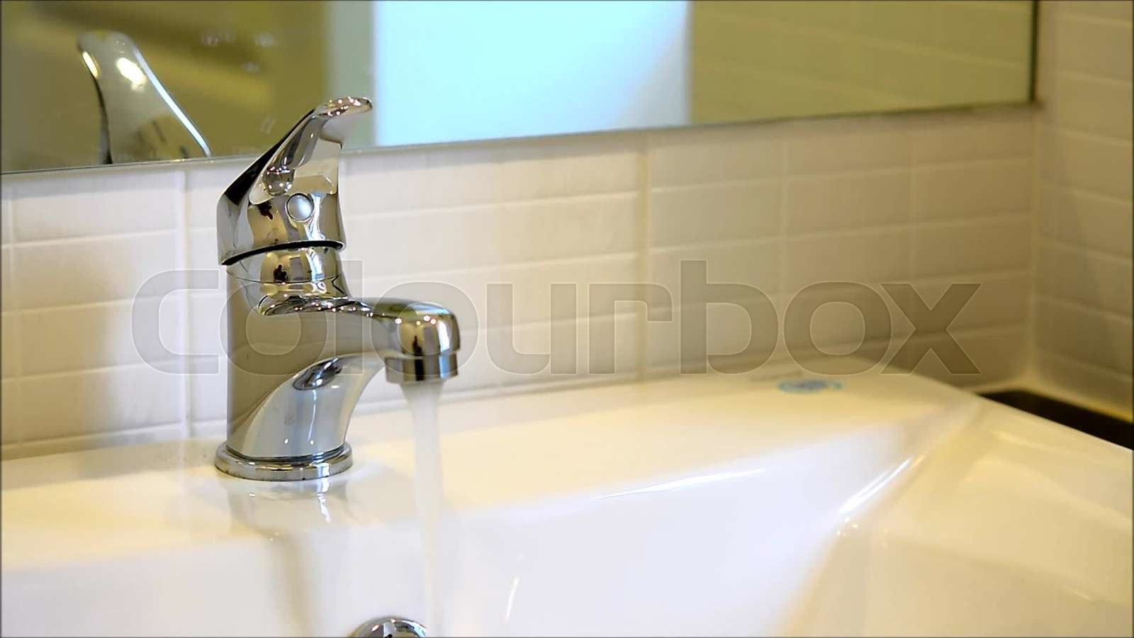 running faucet Stock video Colourbox