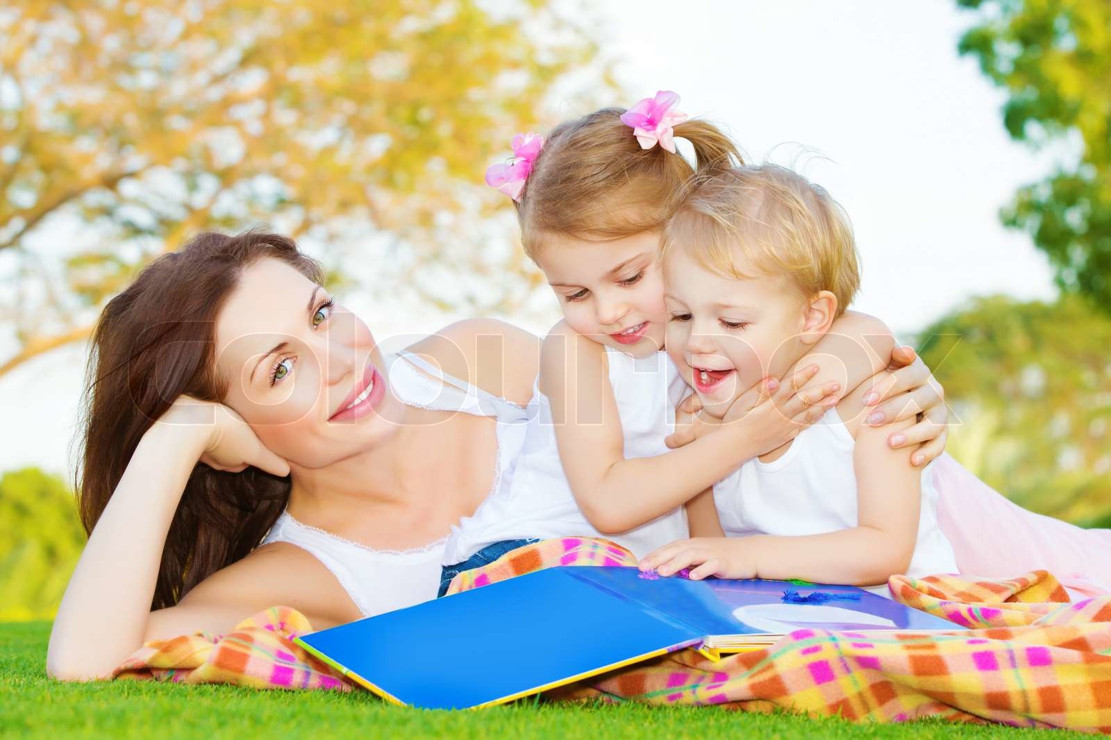 Mother with two kids outdoors | Stock image | Colourbox