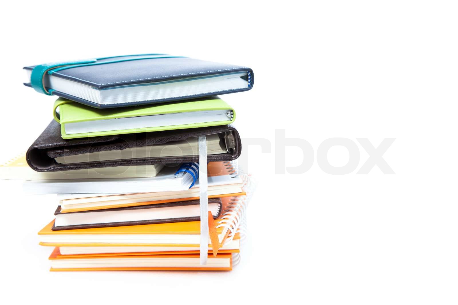 Book stak på hvid isolerede Stock foto Colourbox