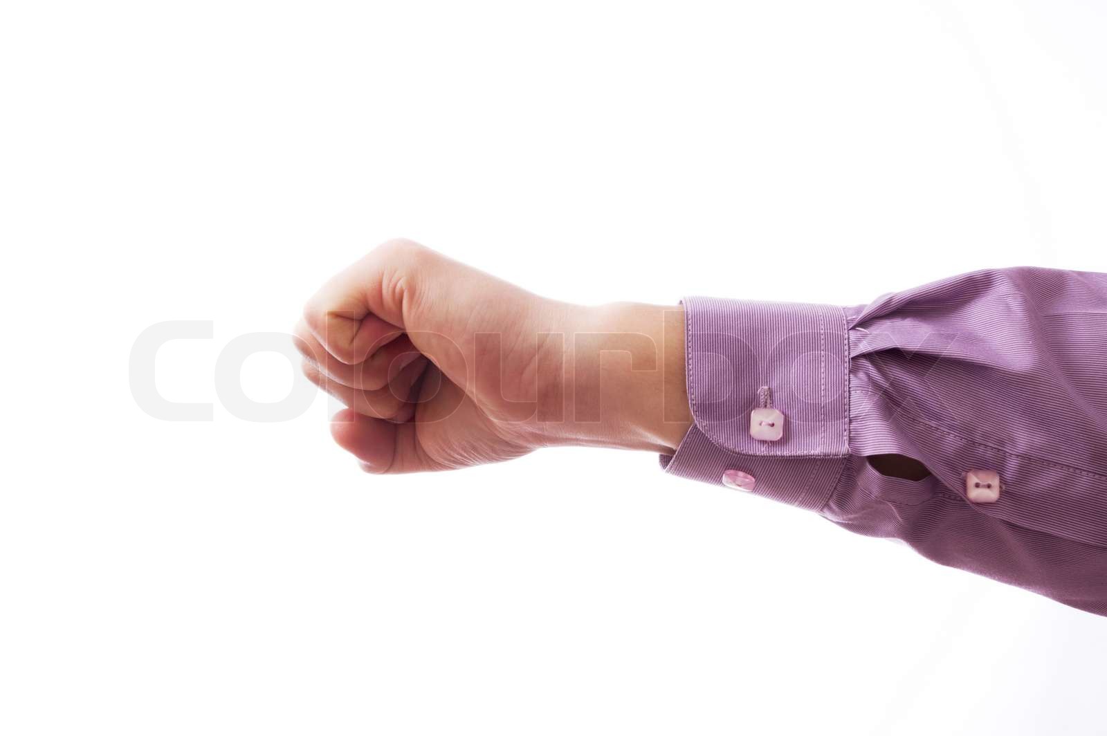 A hand clutched in his fist Stock image Colourbox