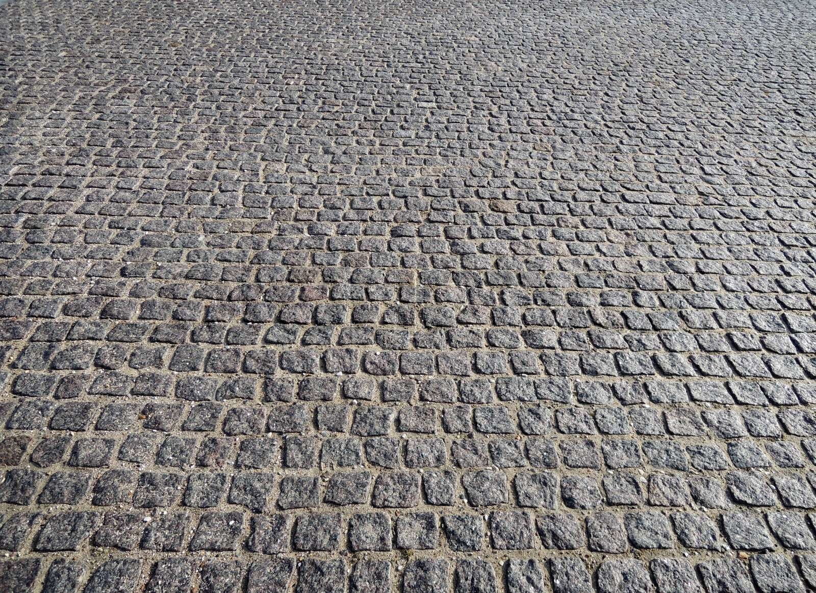 Closeup Blick auf eine Straße mit Kopfsteinpflaster - Muster ...