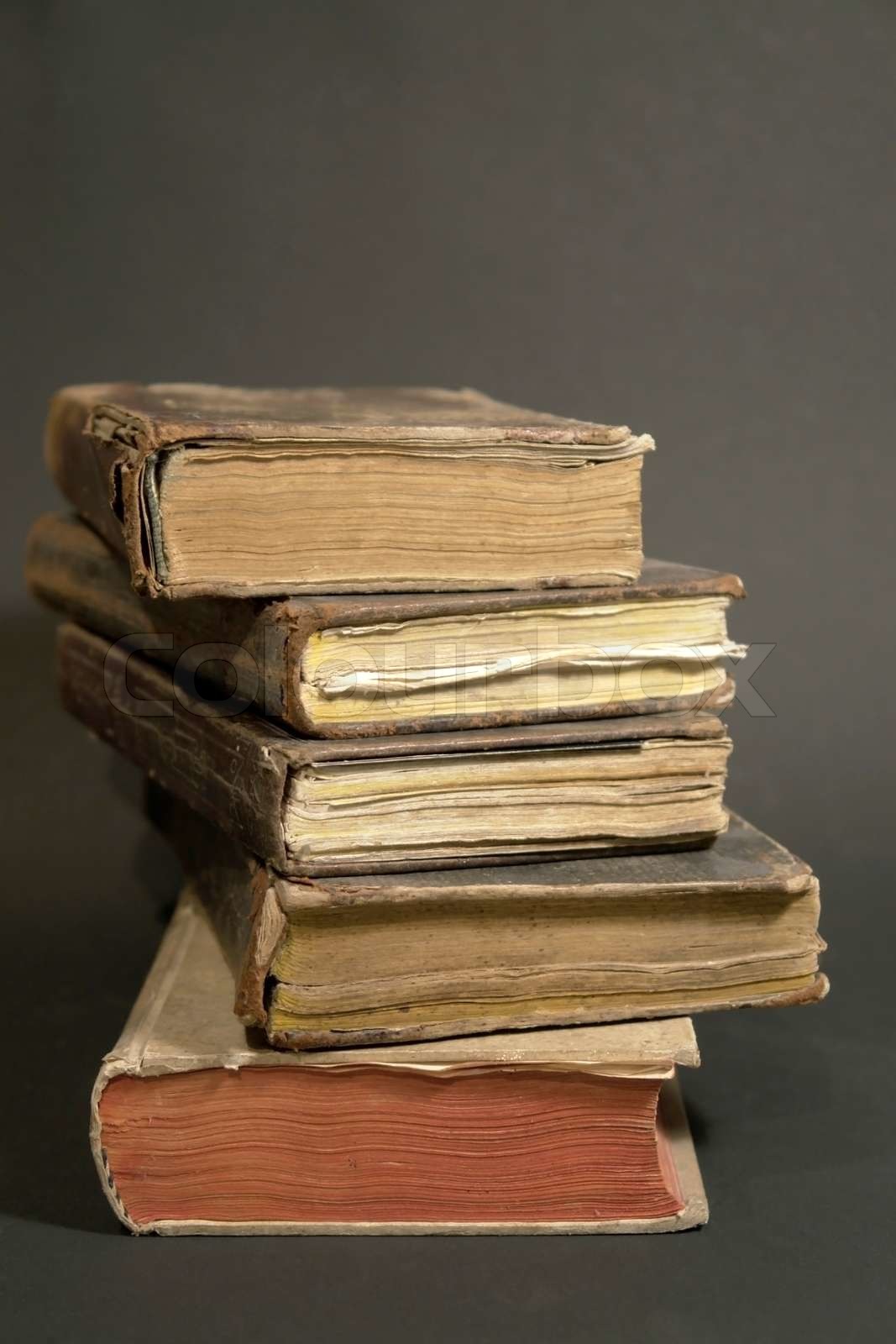 stack of historic books Stock image Colourbox