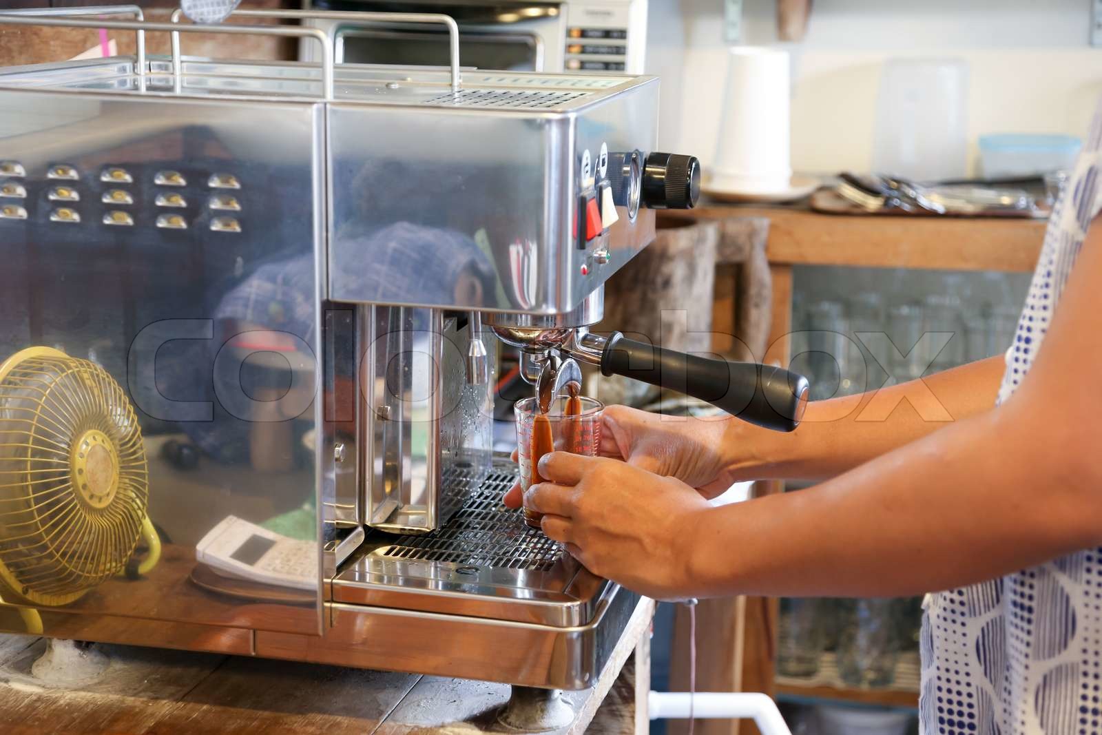 Making a double shot of espresso from coffee machine Stock image