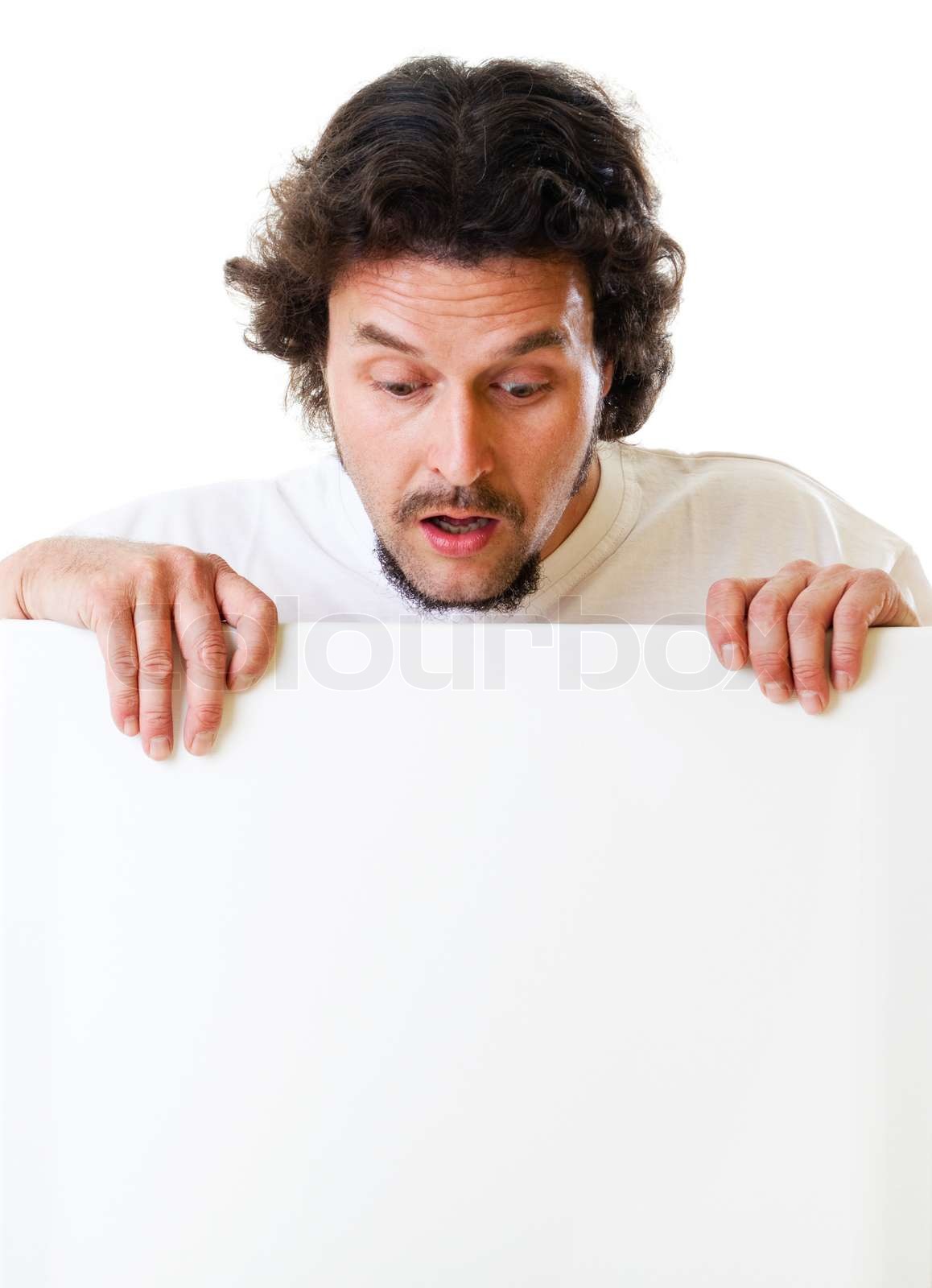 Mid aged Man Looking Down On A Sign Stock Image Colourbox