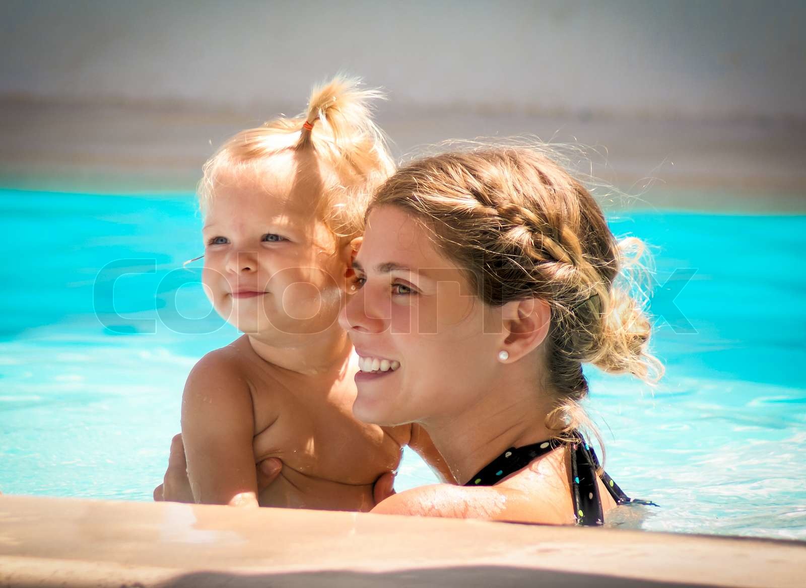 Mom and Daughter in the pool | Stock image | Colourbox