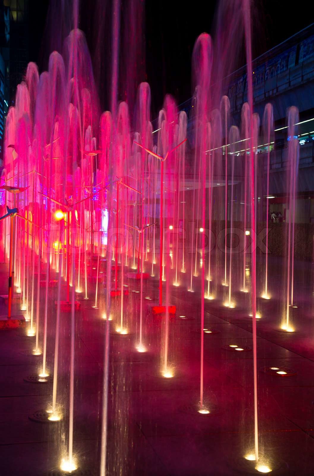 Show colored water fountain at night | Stock image | Colourbox