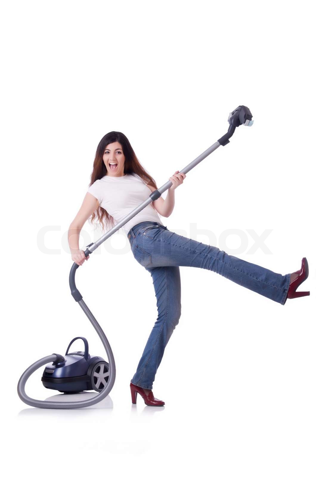 Junge Frau mit Staubsauger auf weiß Stock Bild Colourbox