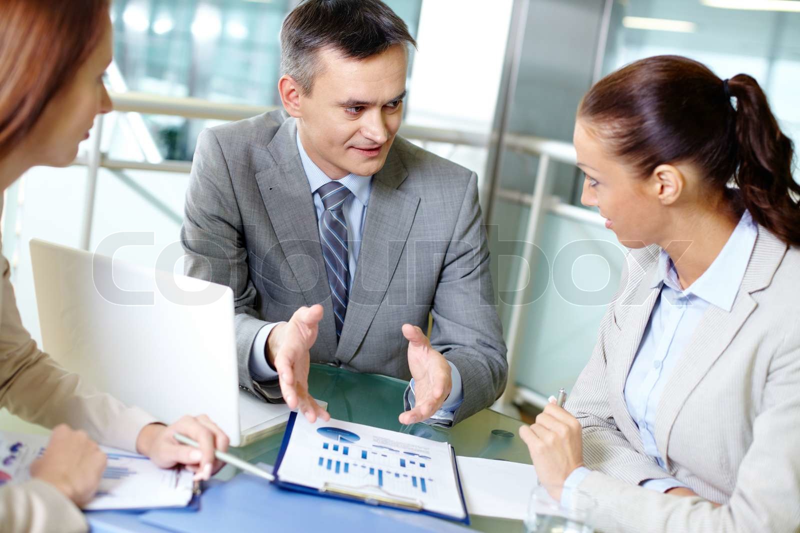 Explaining work | Stock image | Colourbox