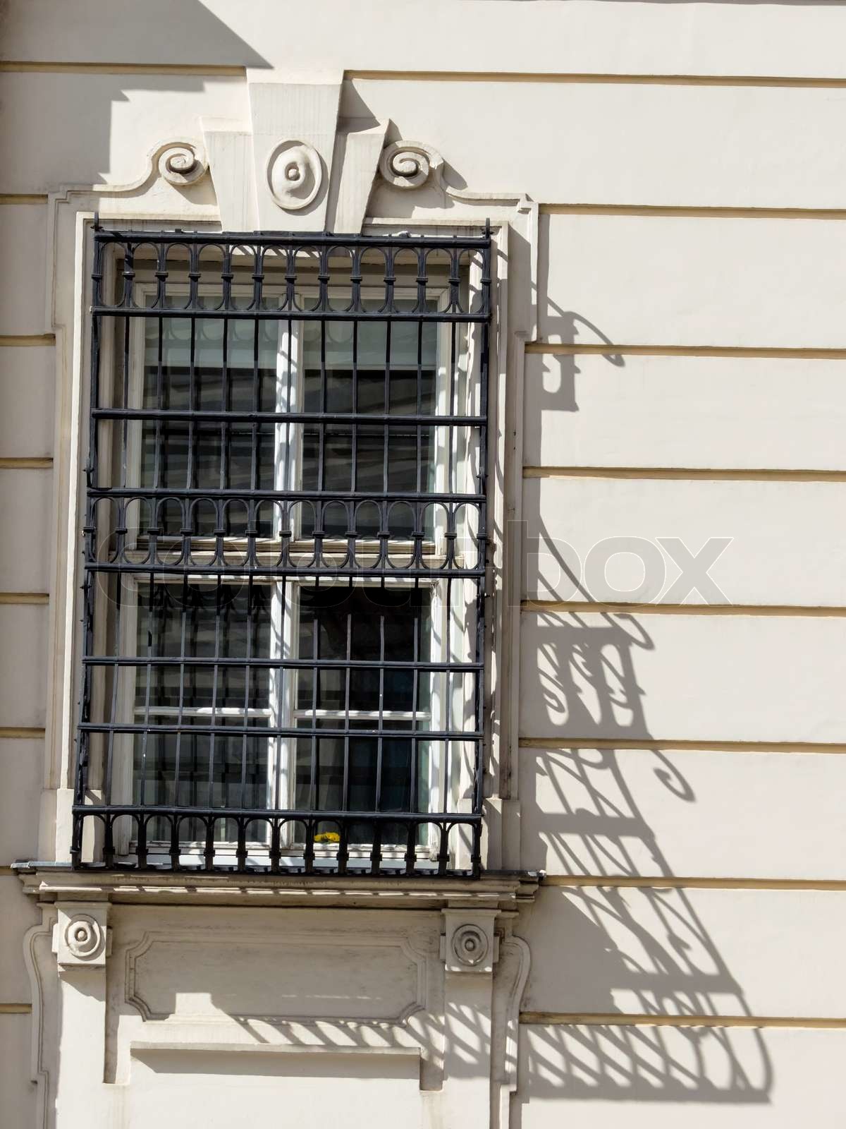 grating in front of a window | Stock image | Colourbox