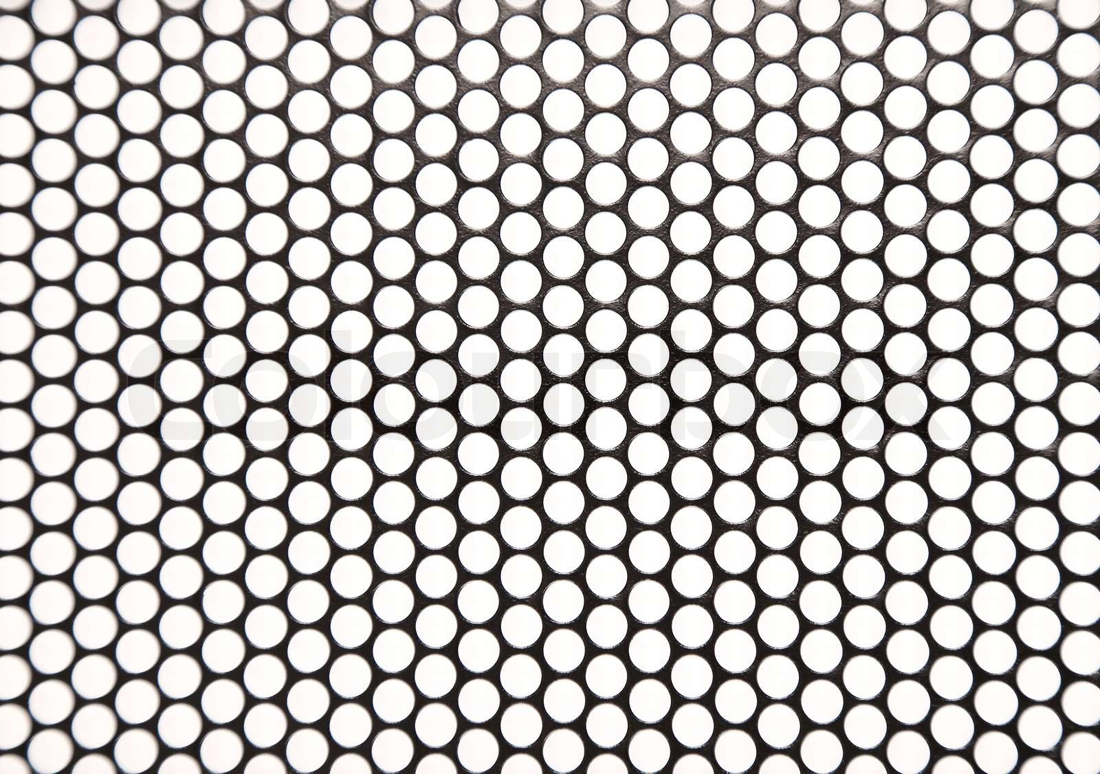 Holed metal | Stock image | Colourbox