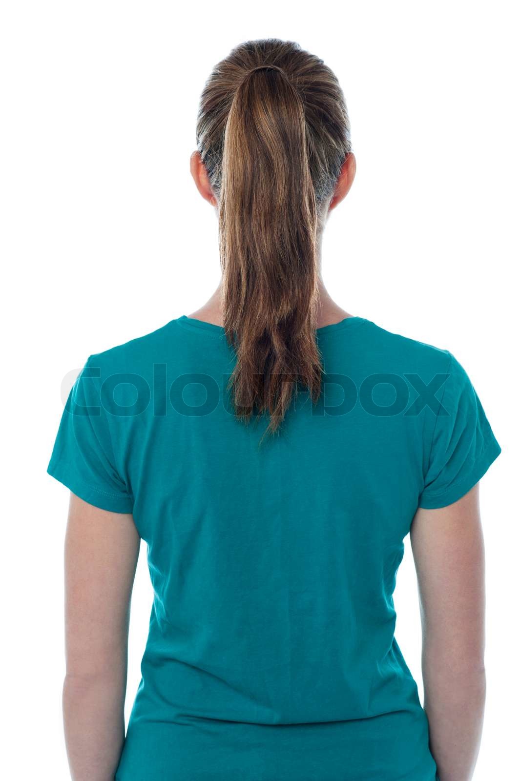 Back pose of a woman facing the wall | Stock image | Colourbox