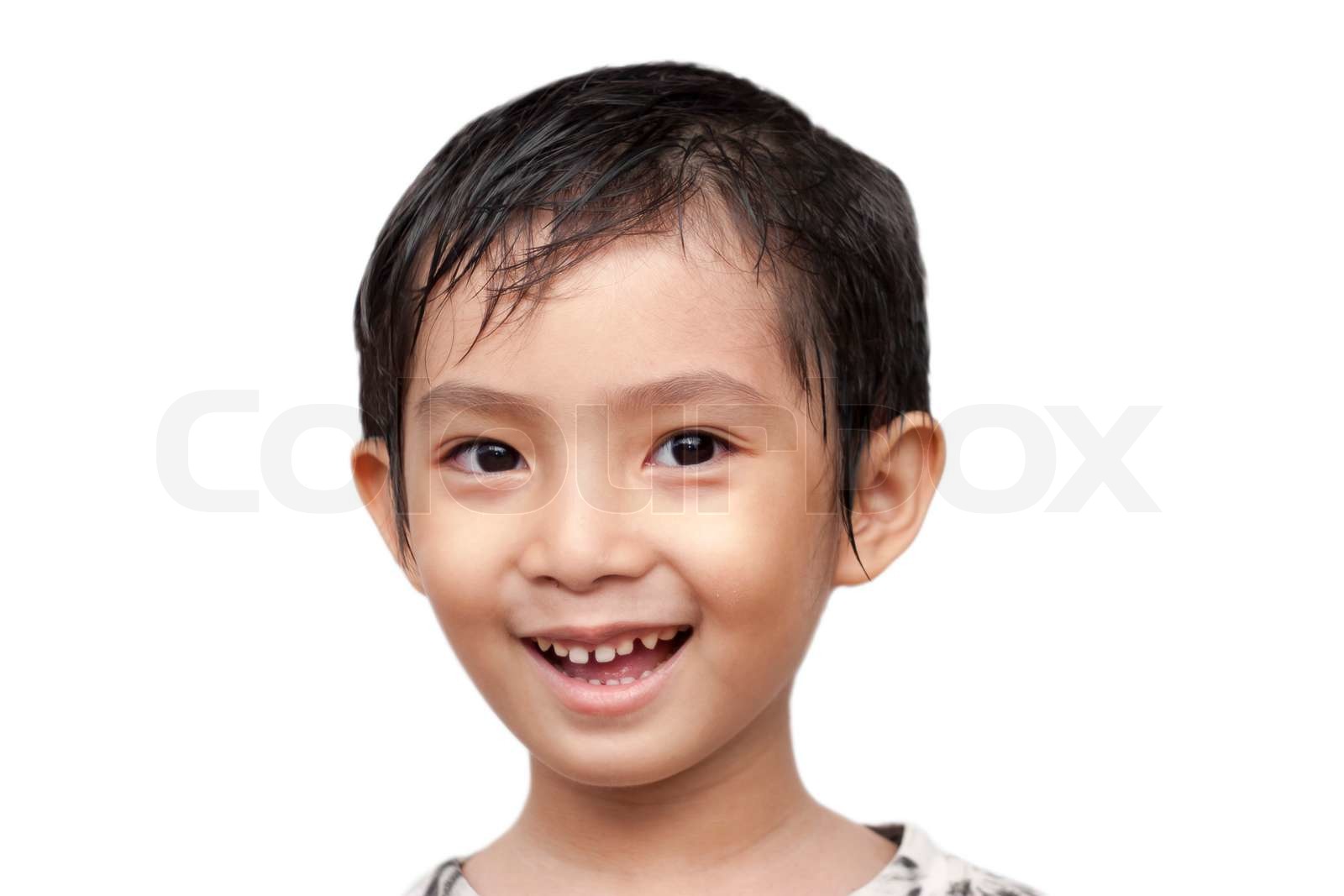 Asian boy smiling on isolate | Stock image | Colourbox