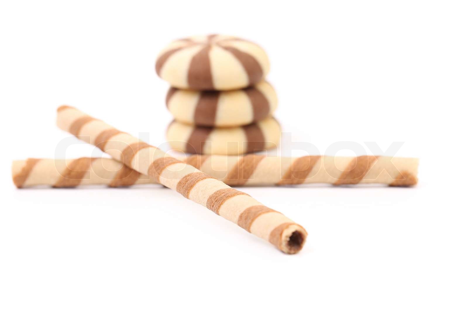 Chocolate striped wafer rolls and stake biscuits Stock image Colourbox