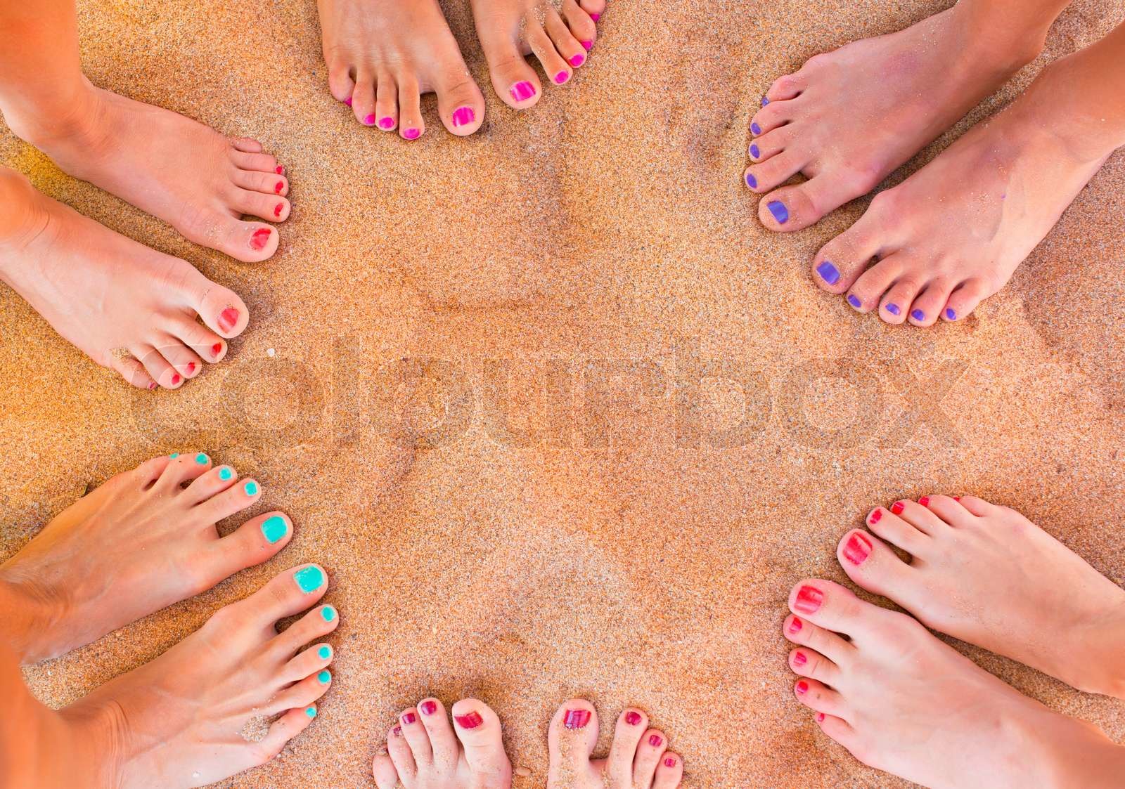 Woman feet on the sand | Stock image | Colourbox