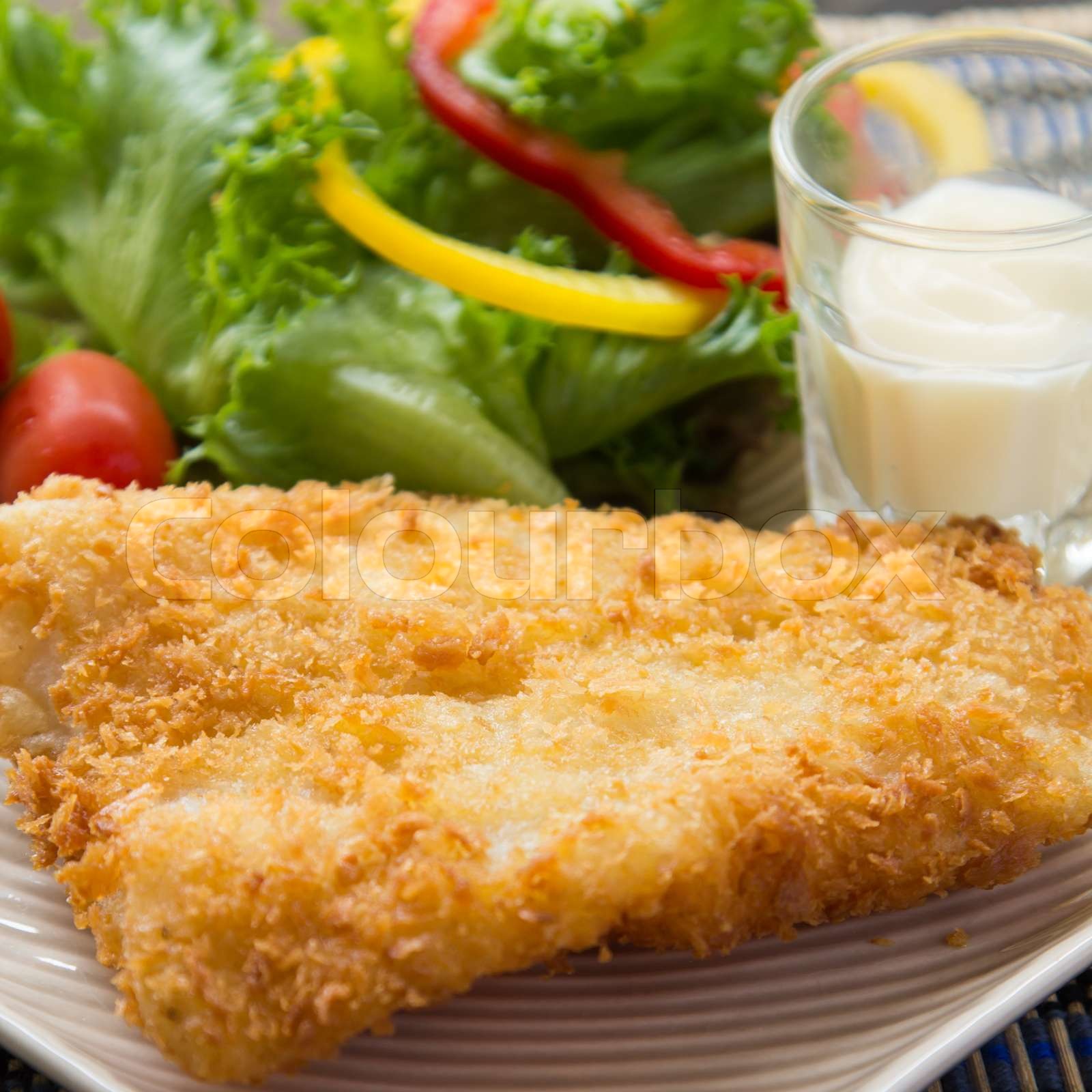 fried fish and salad | Stock image | Colourbox