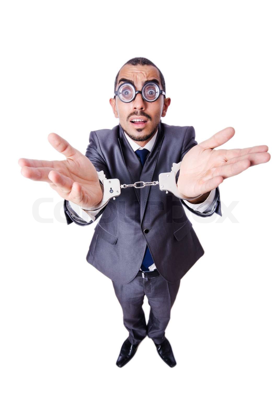 Funny businessman with handcuffs on white Stock image Colourbox