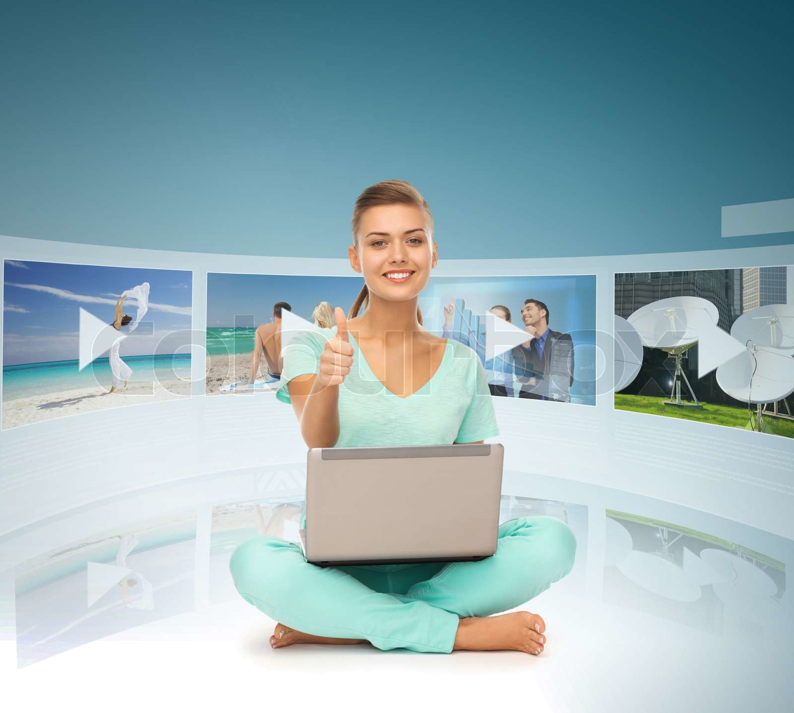 woman with laptop pc and virtual screens | Stock image | Colourbox