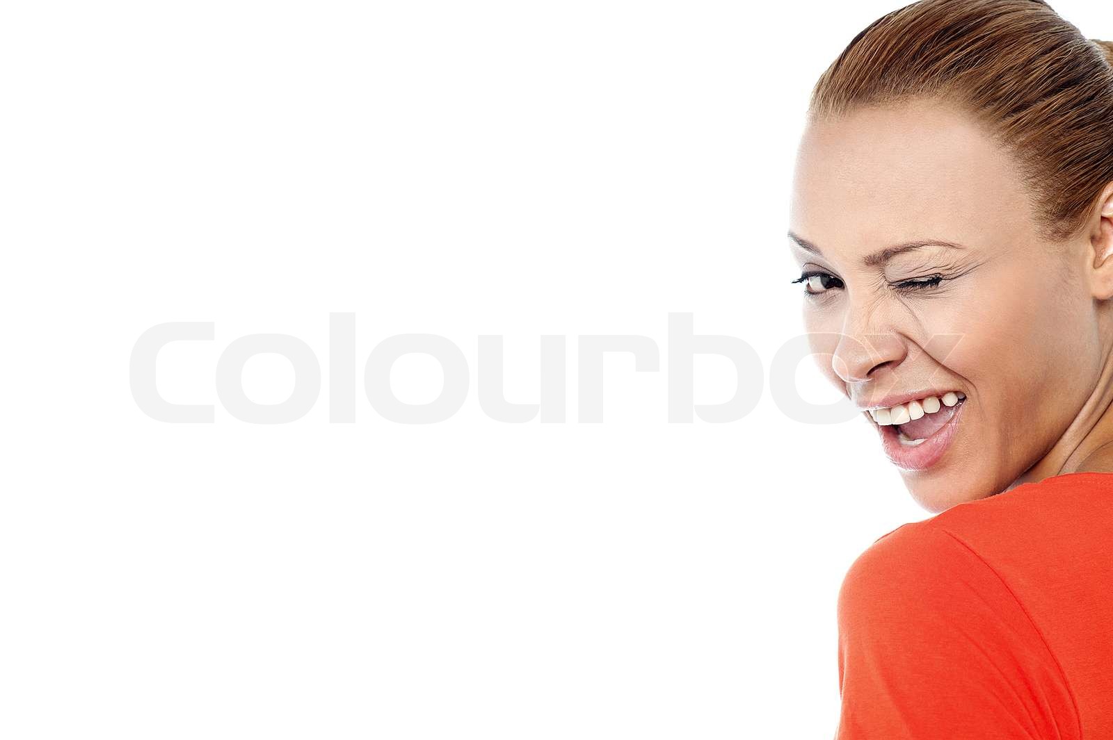Kokett junge Frau zwinkert Stock Bild Colourbox