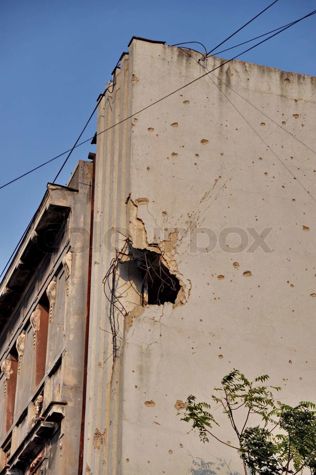 Bullet holes of the war on a damaged building in Bosnia Hercegovina