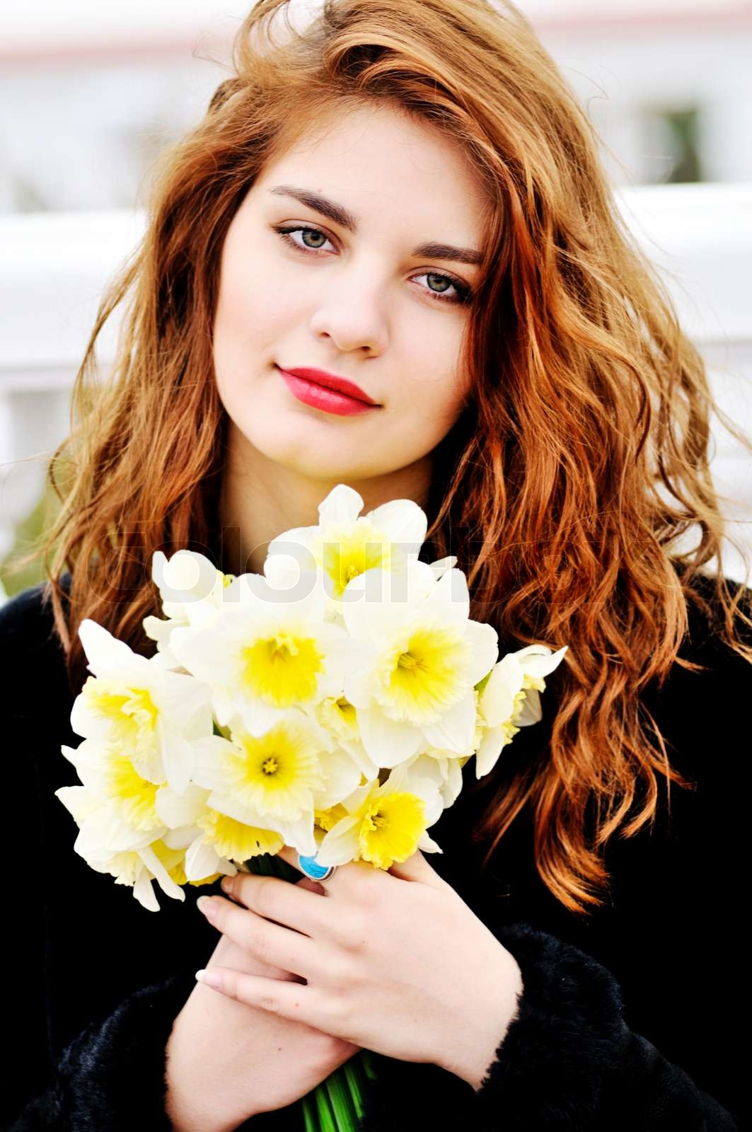 girl with daffodils Stock image Colourbox