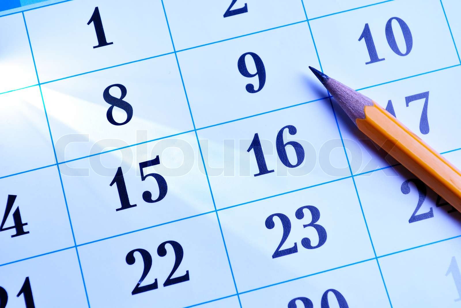 Pencil on a calendar Stock image Colourbox