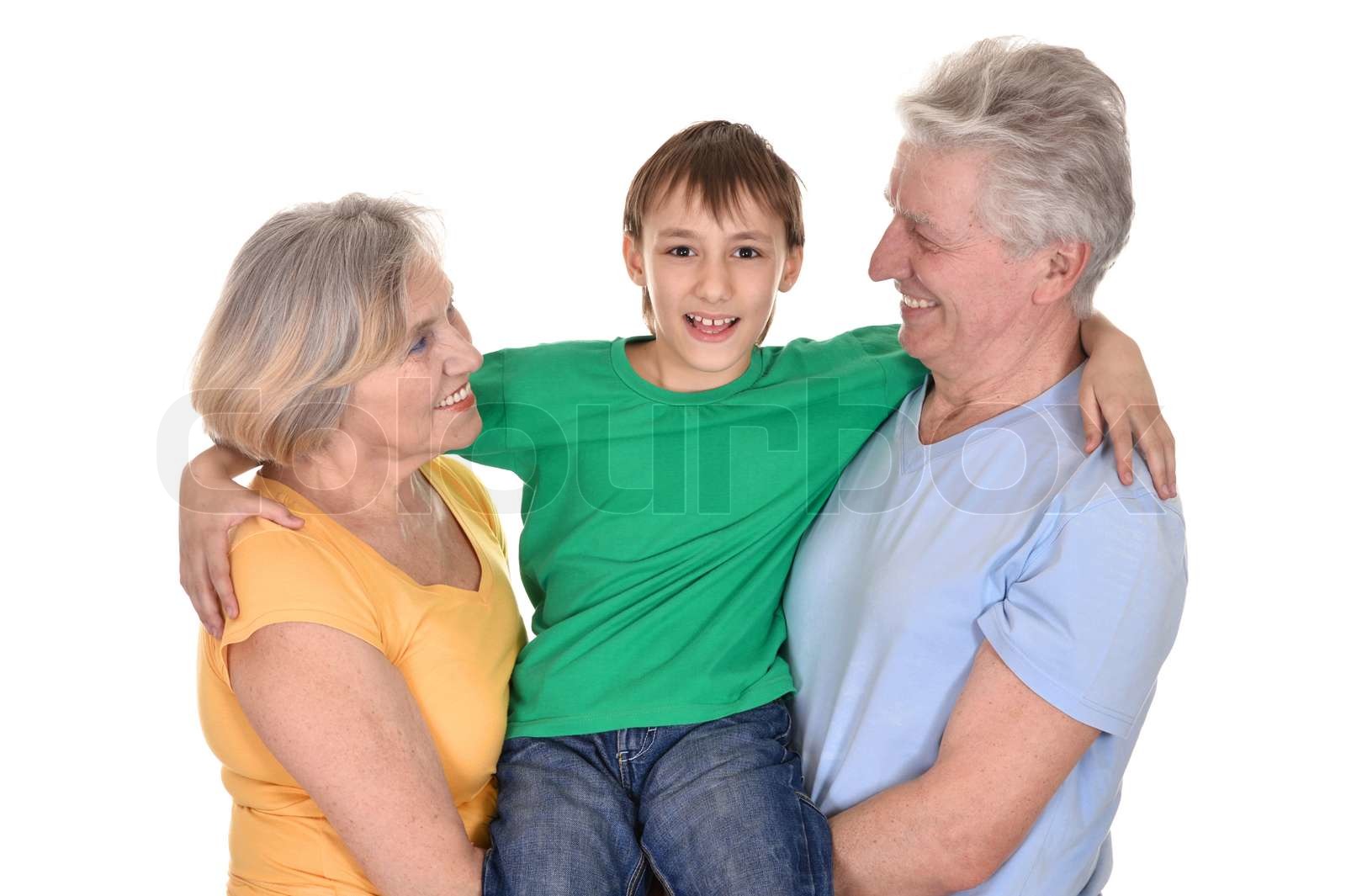 fröhlich Großeltern und Enkel auf einem weißen Hintergrund Stock Bild Colourbox