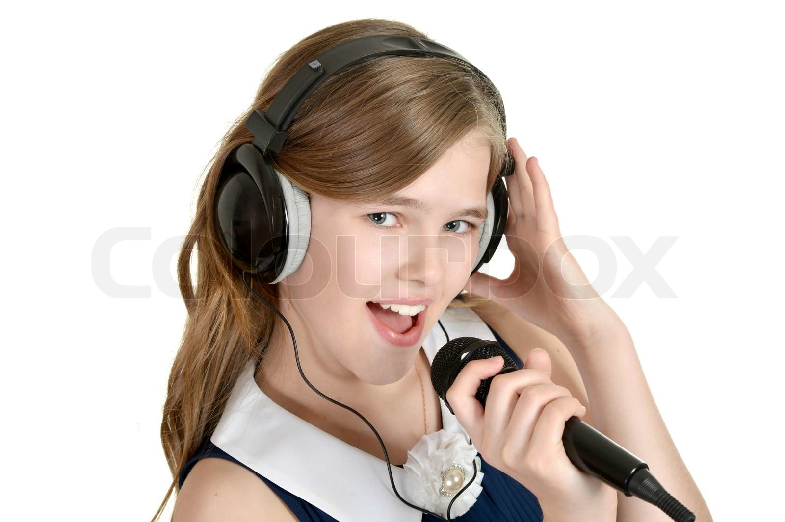 girl in a blue dress Stock image Colourbox