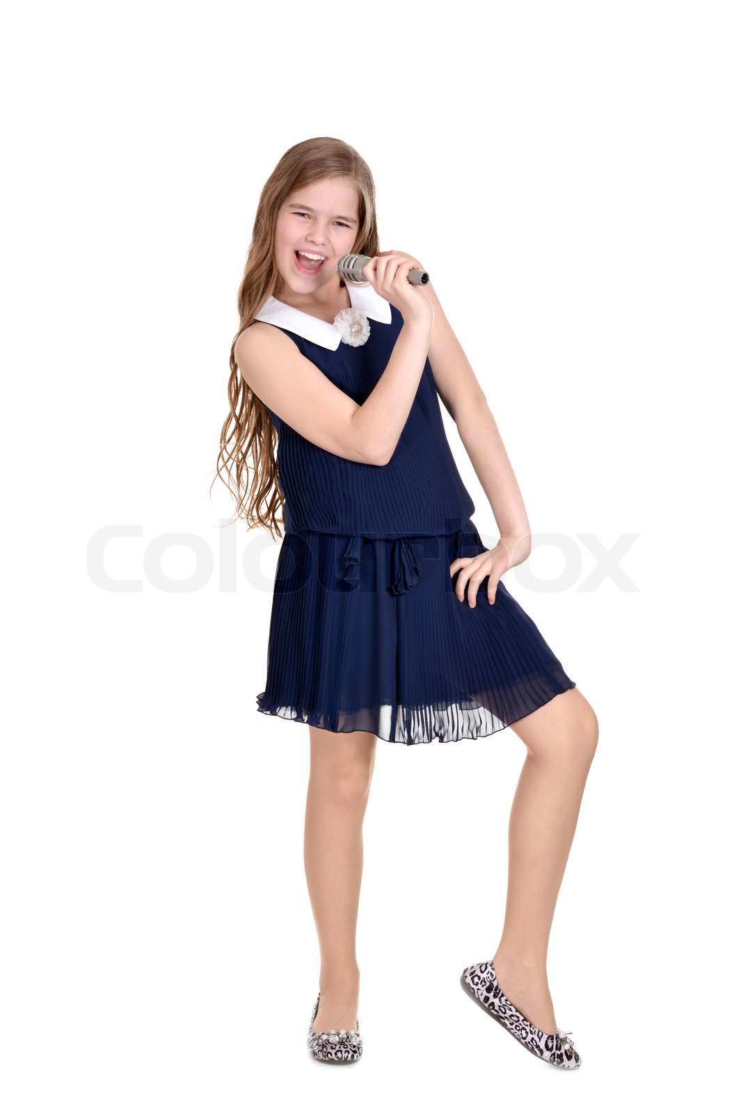 girl in a blue dress Stock image Colourbox