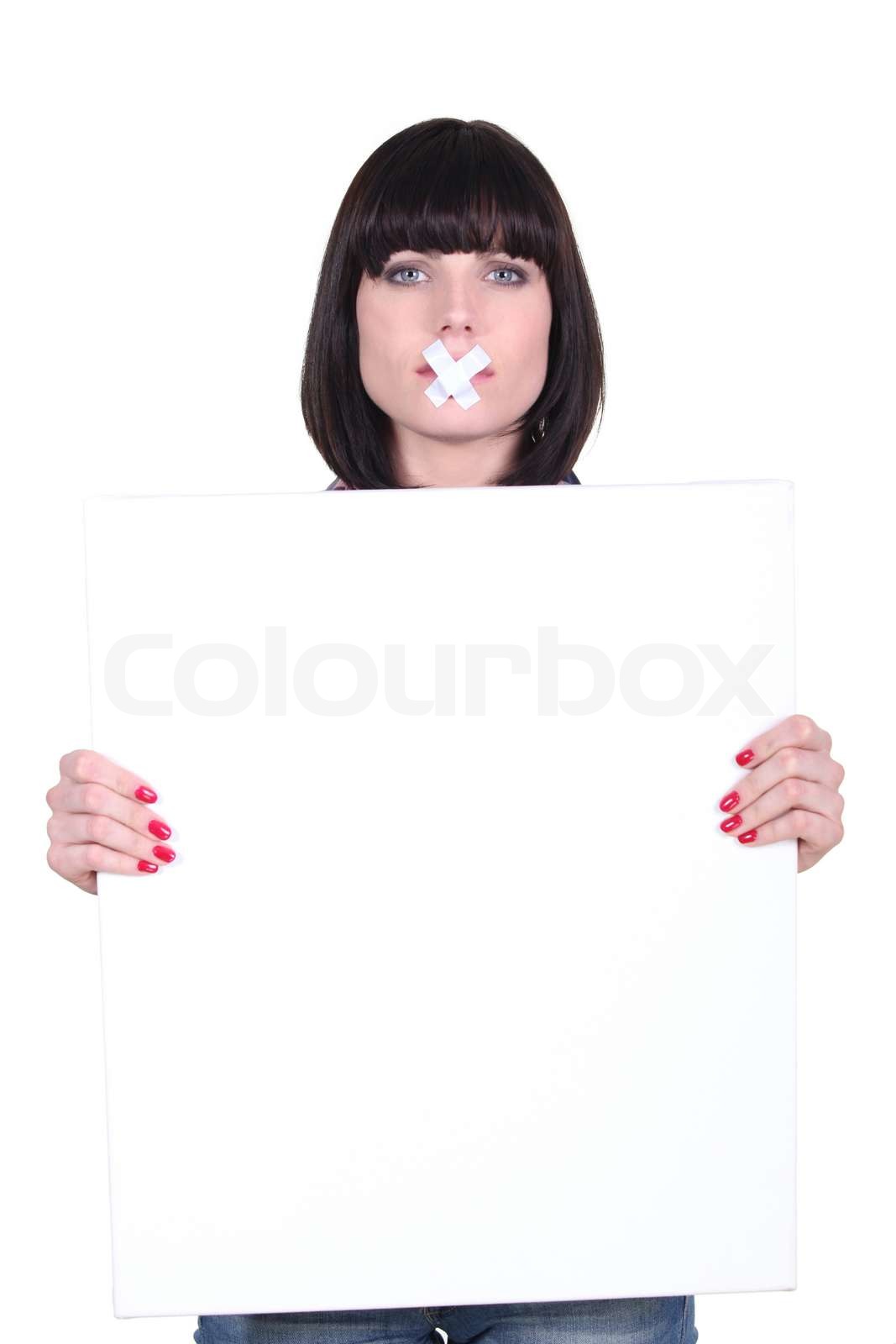 Woman holding message board stock image colourbox