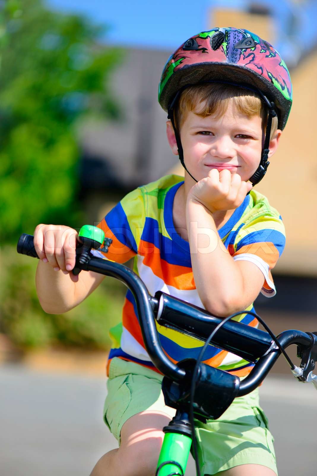 little boy riding bike