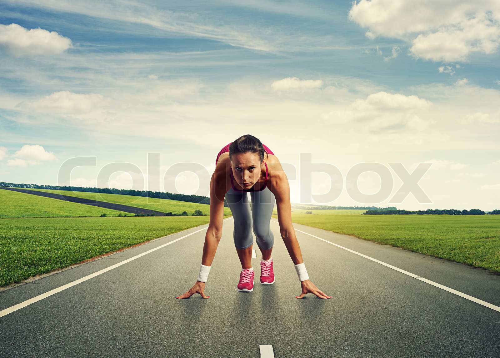 sprinter standing on the start | Stock image | Colourbox