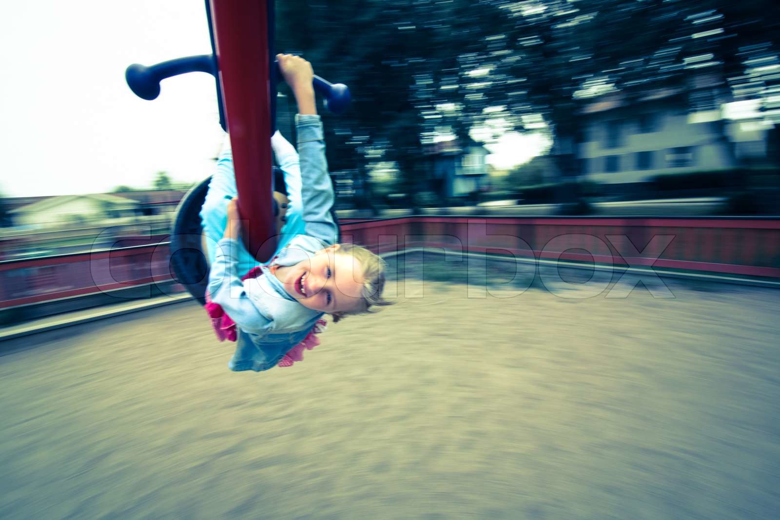 Snurrgunga Min dotter Tilda i en snurrgunga | Stock image | Colourbox