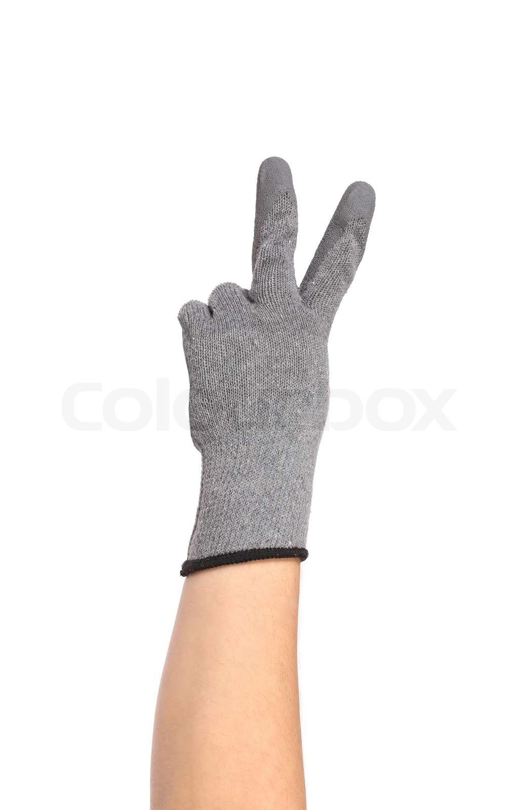 Hand zeigt zwei in Gummihandschuh | Stock Bild | Colourbox