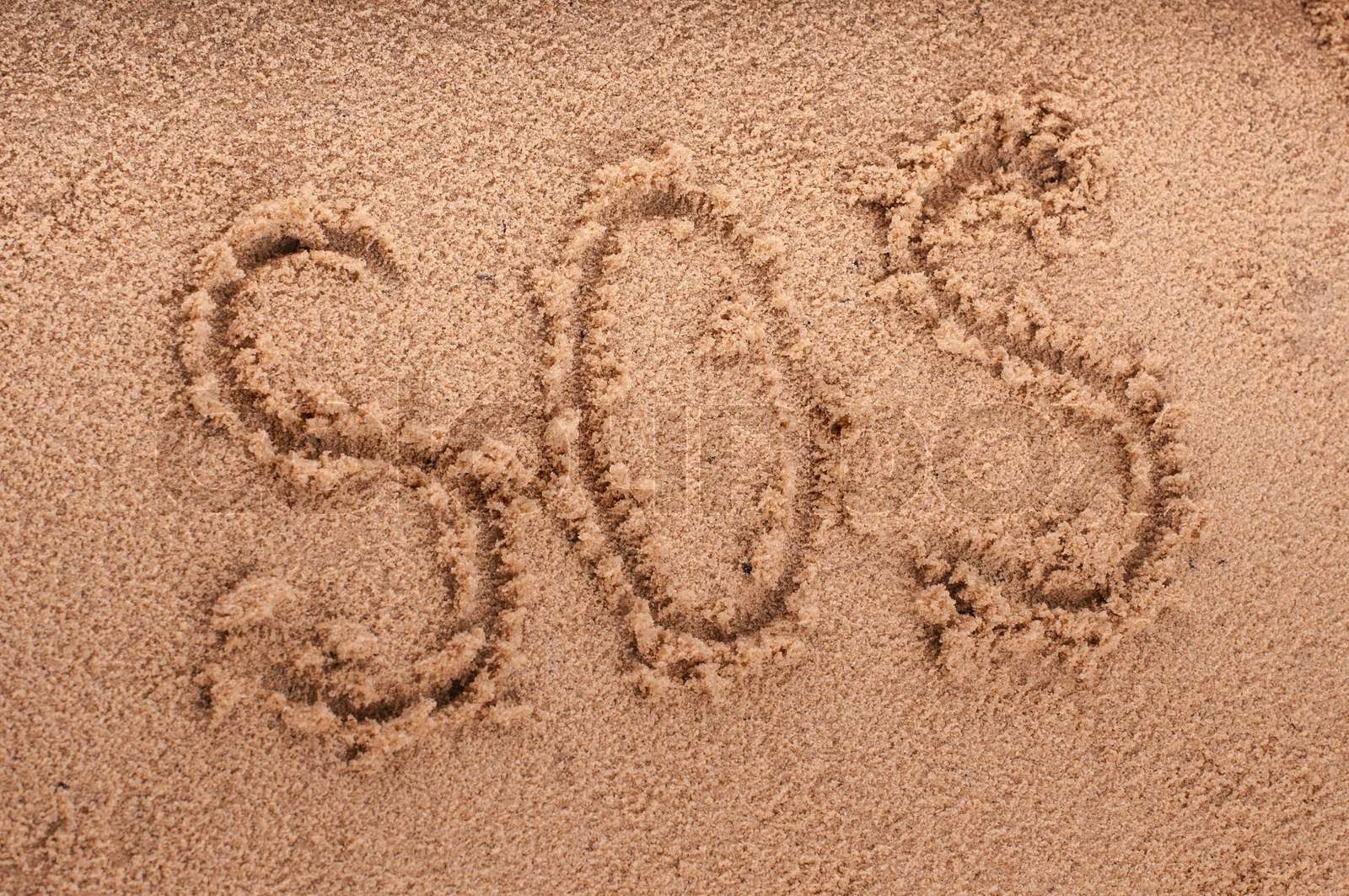 SOS on the beach sand at the sea | Stock image | Colourbox