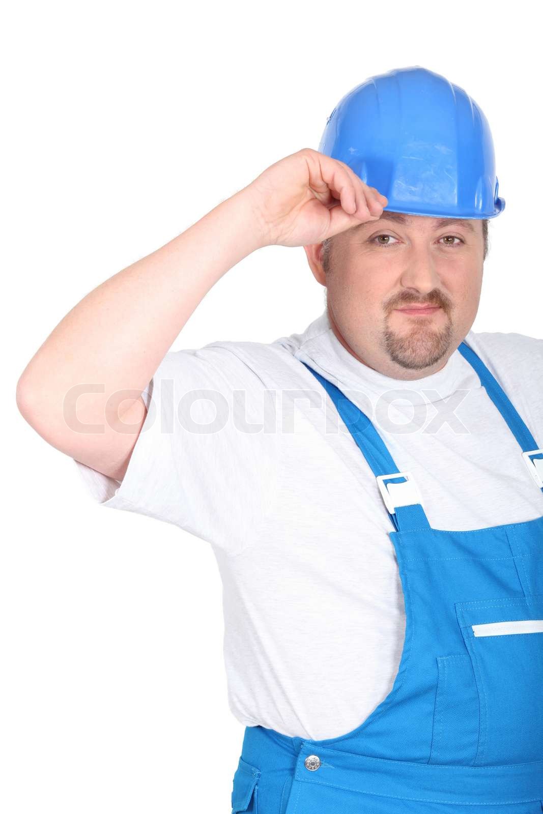 Handwerker machen einen HutTipp Stock Bild Colourbox