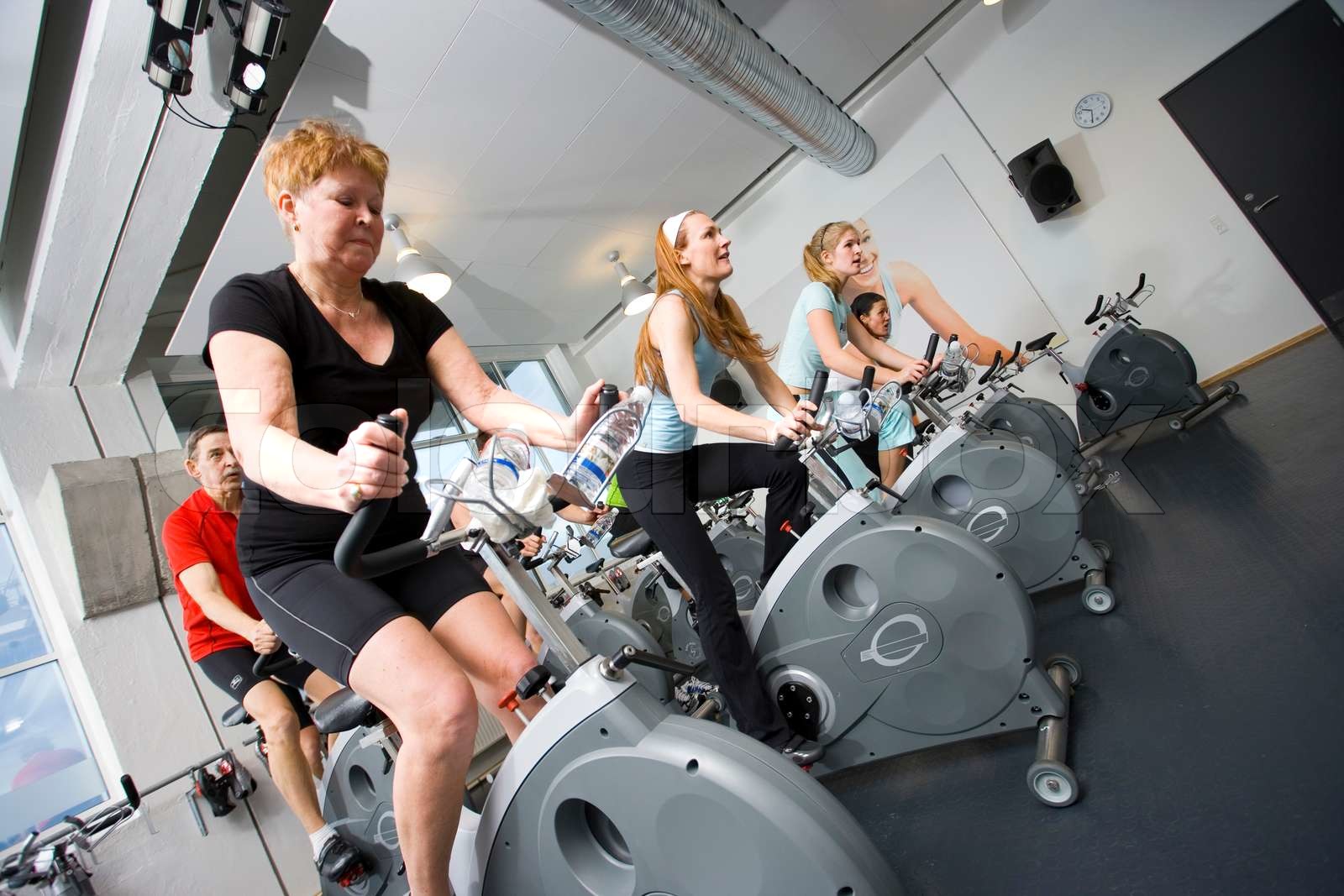 Caucasian women in fitness center Stock image Colourbox