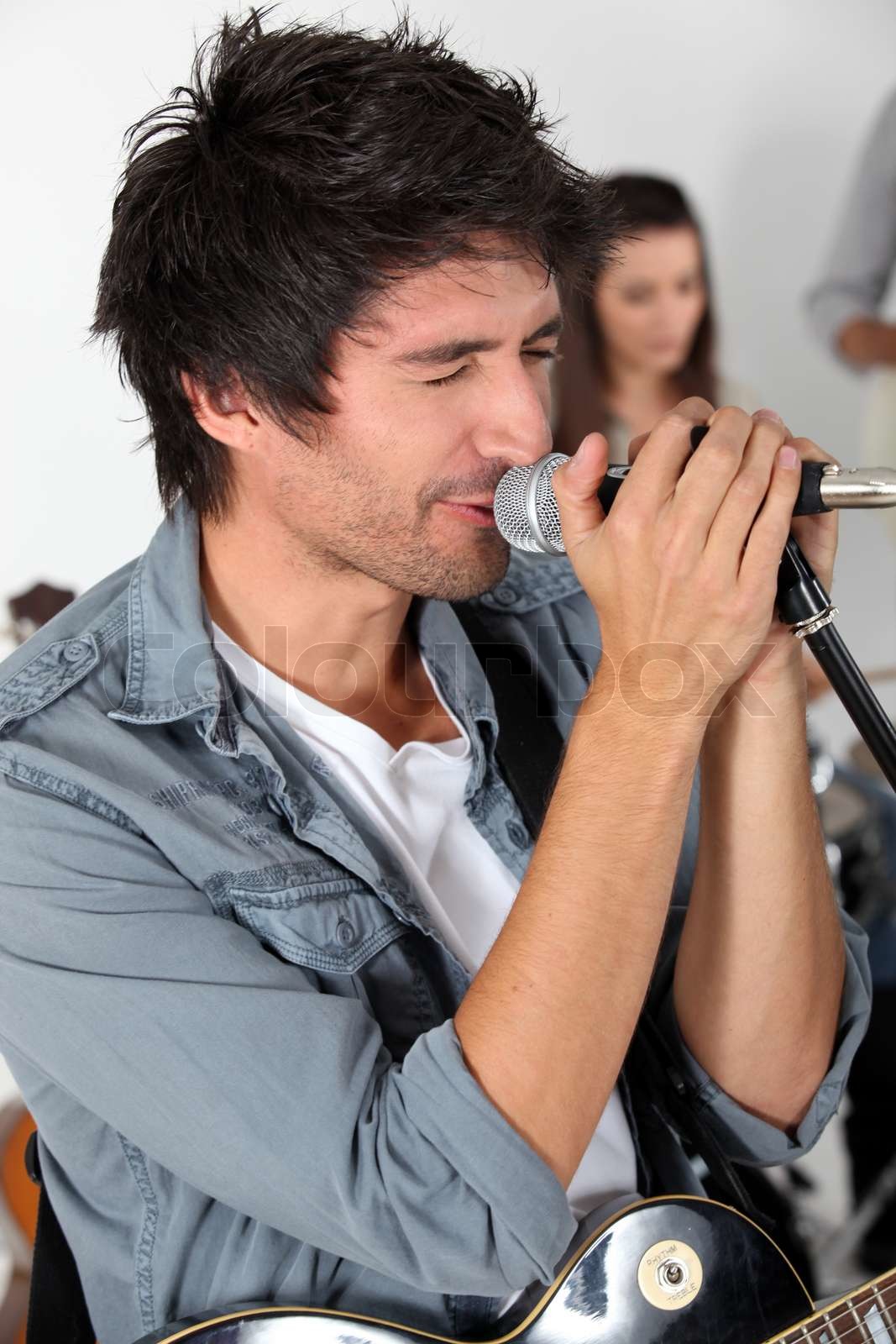 Male vocalist in a rock band | Stock image | Colourbox
