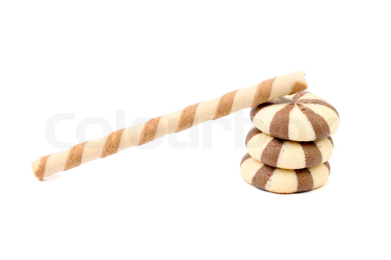 Chocolate striped wafer rolls and stake biscuits Stock image Colourbox