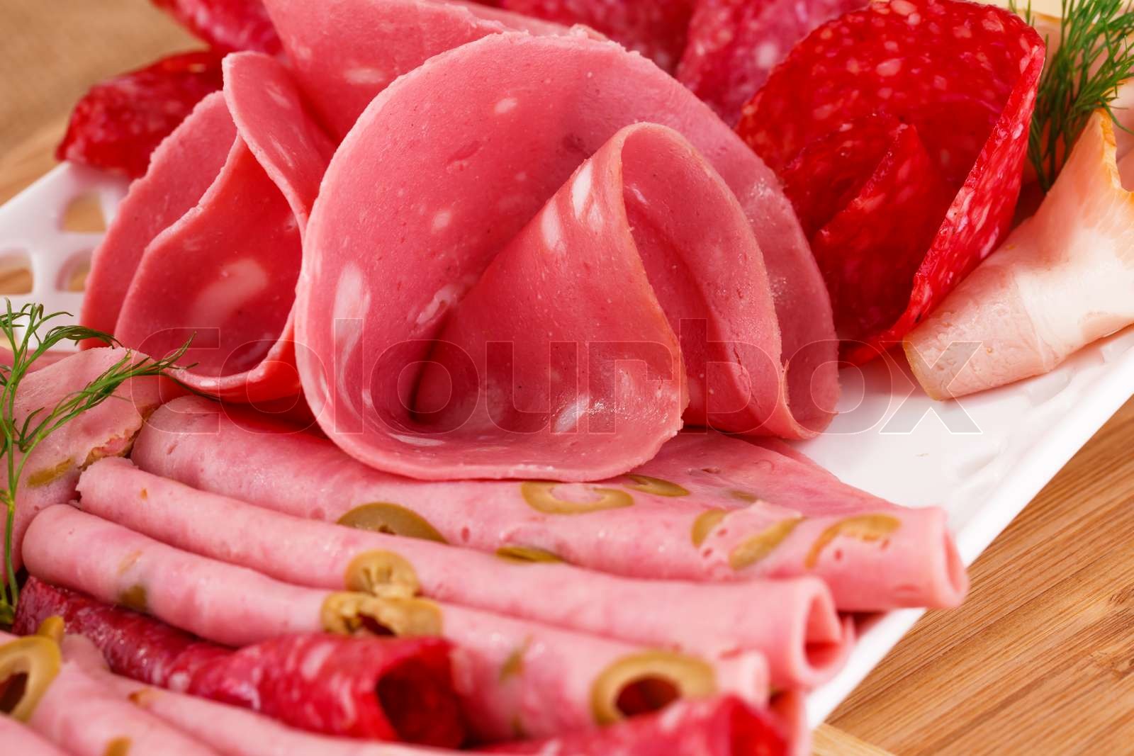 Salami , mortadella og bacon Stock foto Colourbox