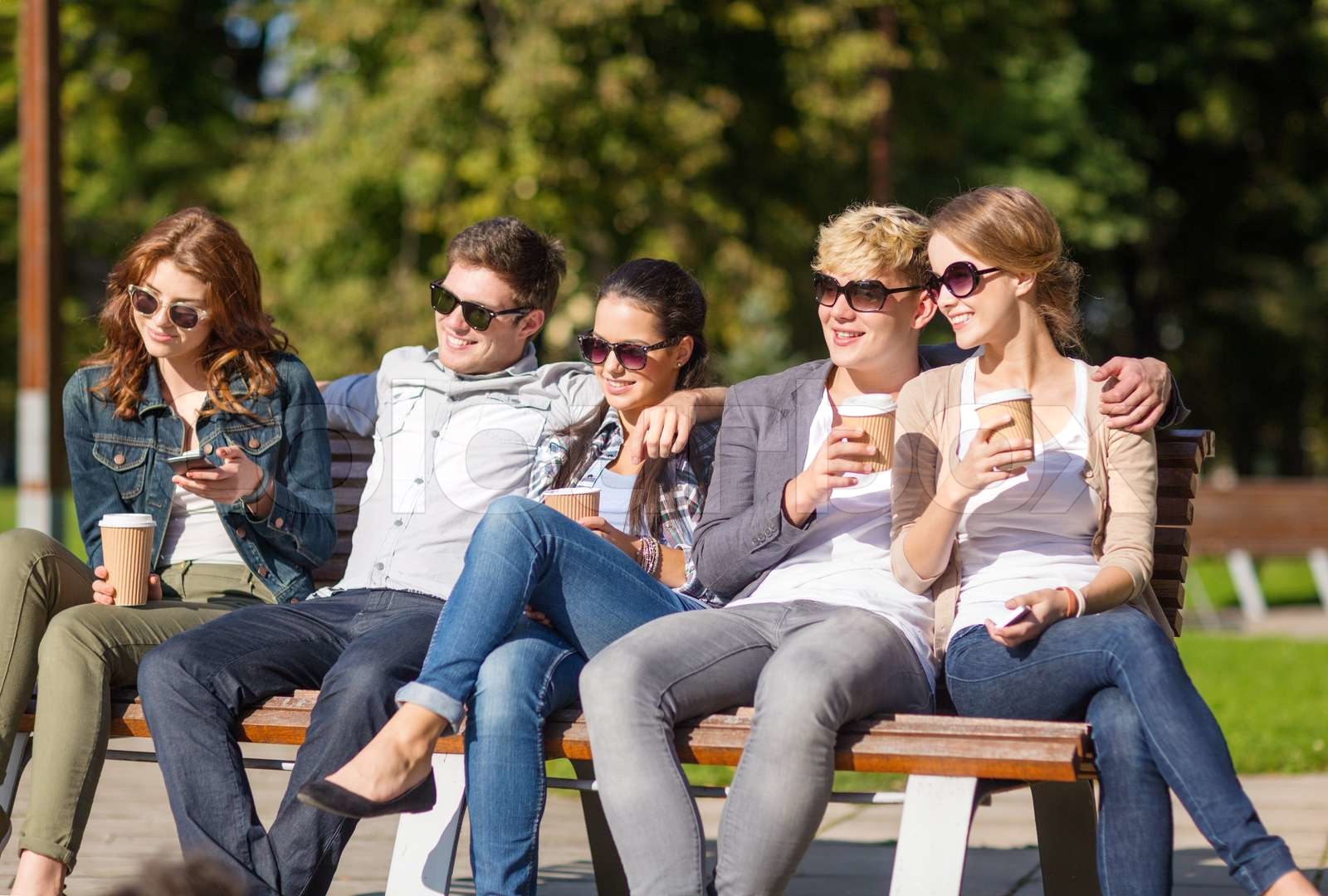 group of students or teenagers hanging out | Stock image | Colourbox