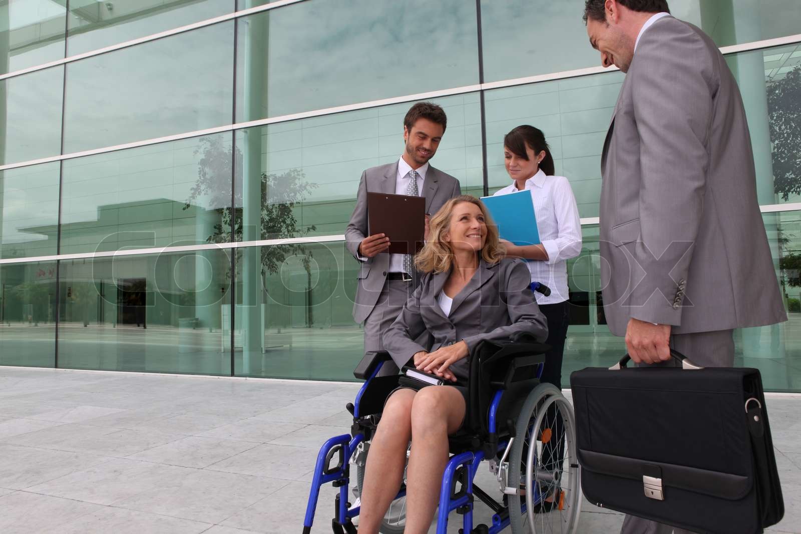 employee in wheelchair Stock image Colourbox