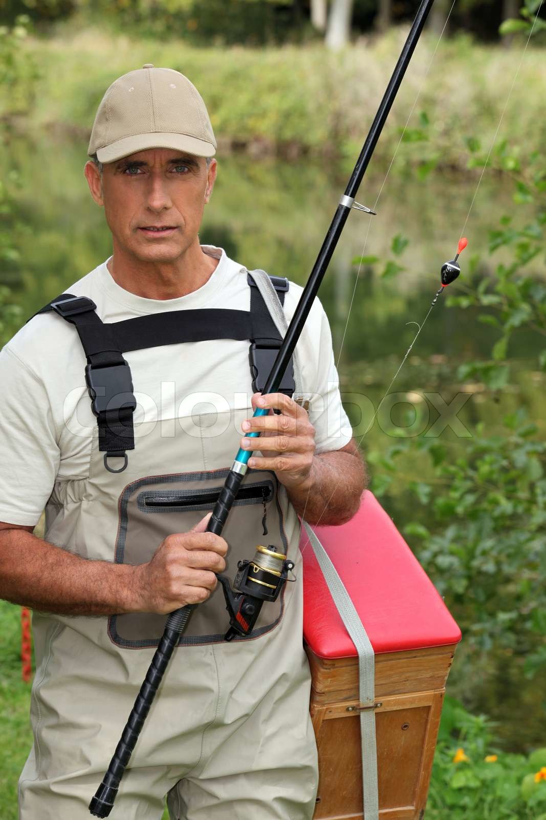 Fisherman in Waders | Stock Bild | Colourbox