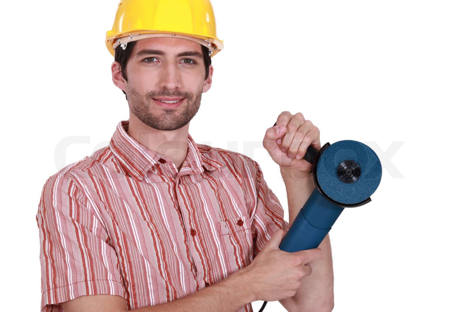 Man holding anglegrinder Stock image Colourbox