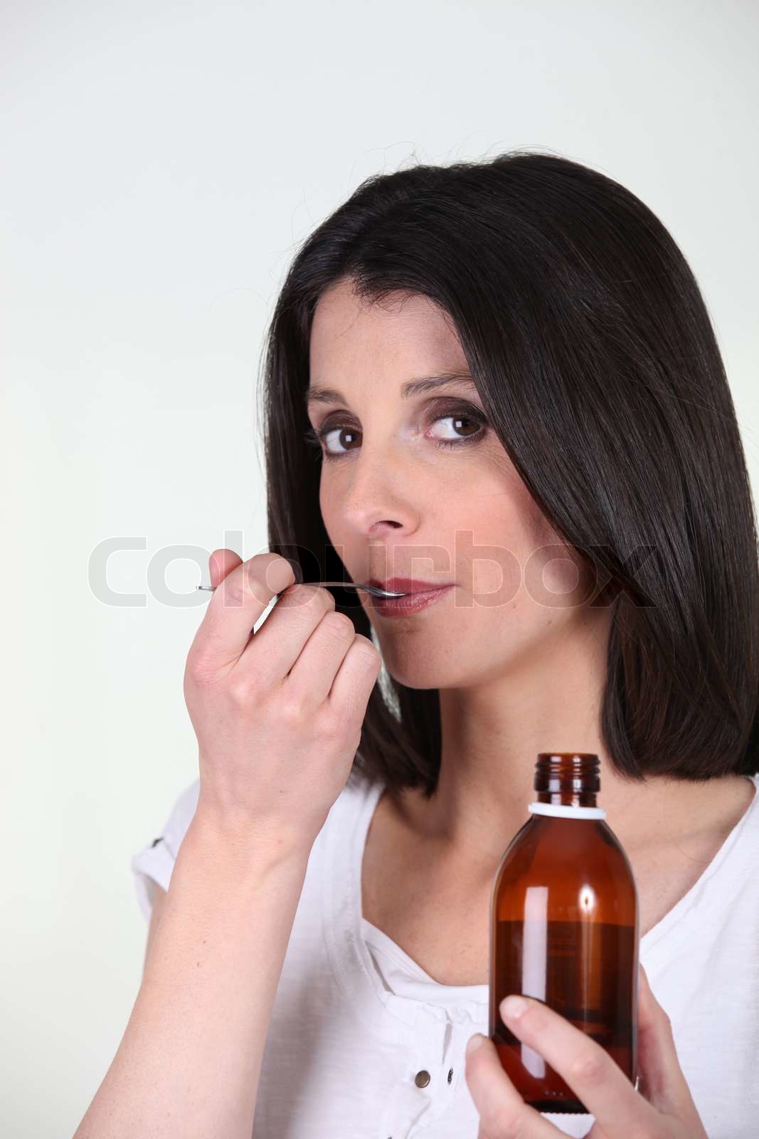taking medication Stock image Colourbox