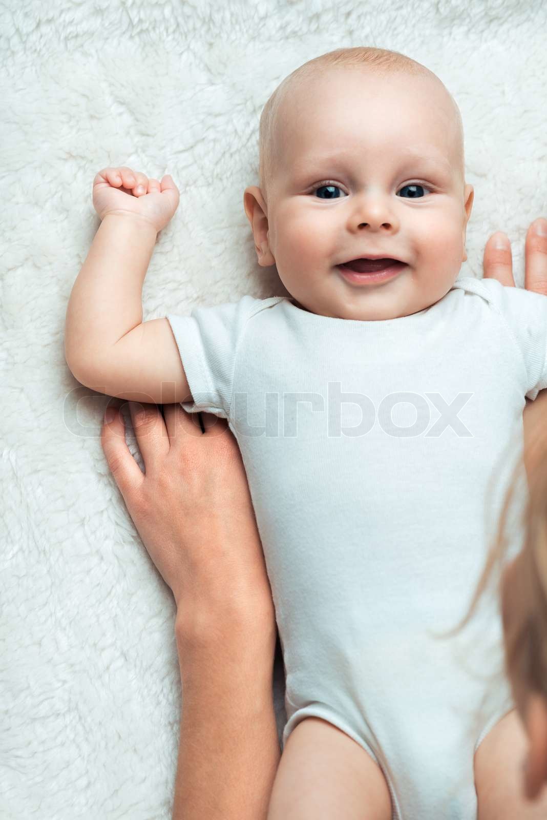 Baby with mum | Stock image | Colourbox