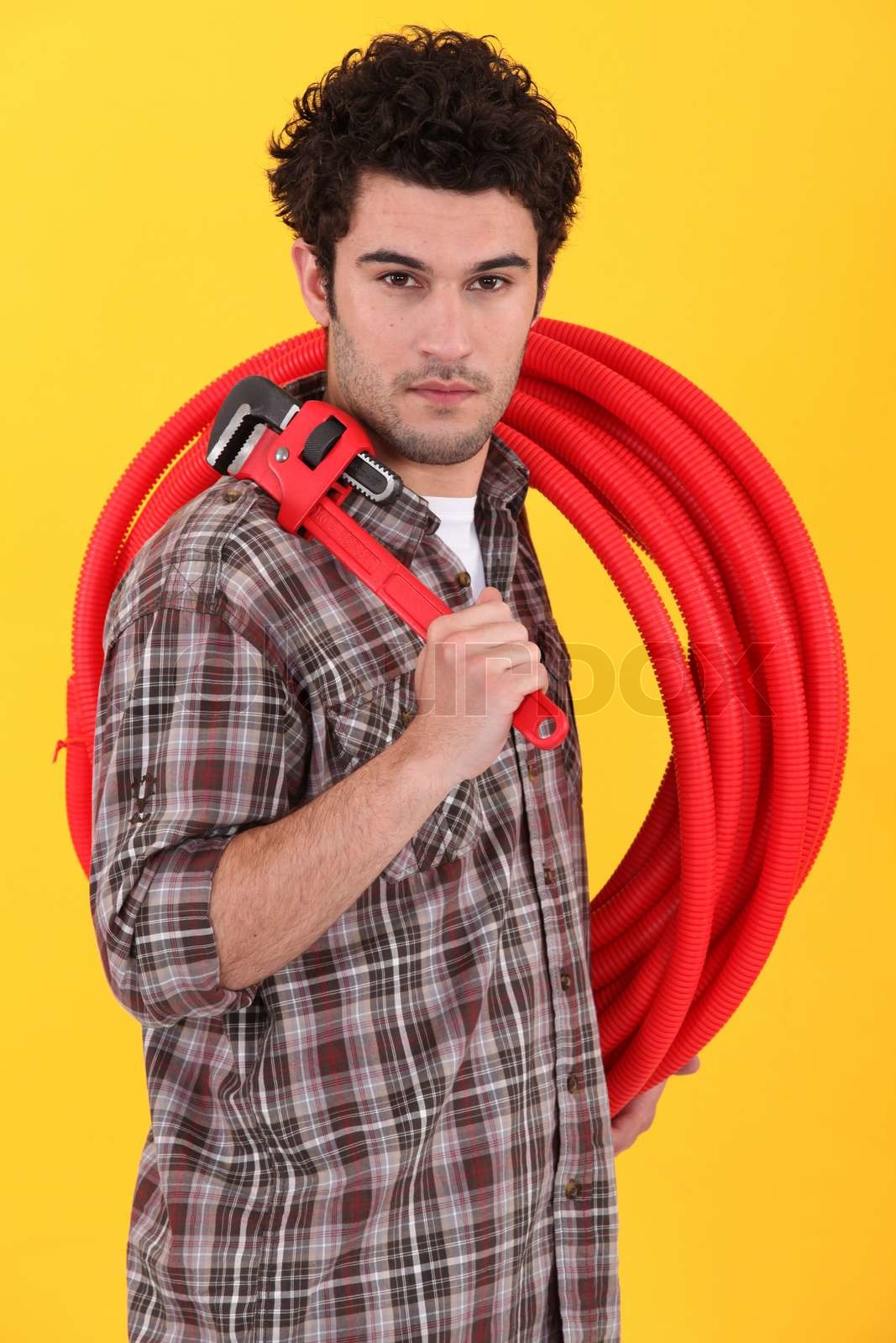 Craftsman wrench and hose reel stock image colourbox