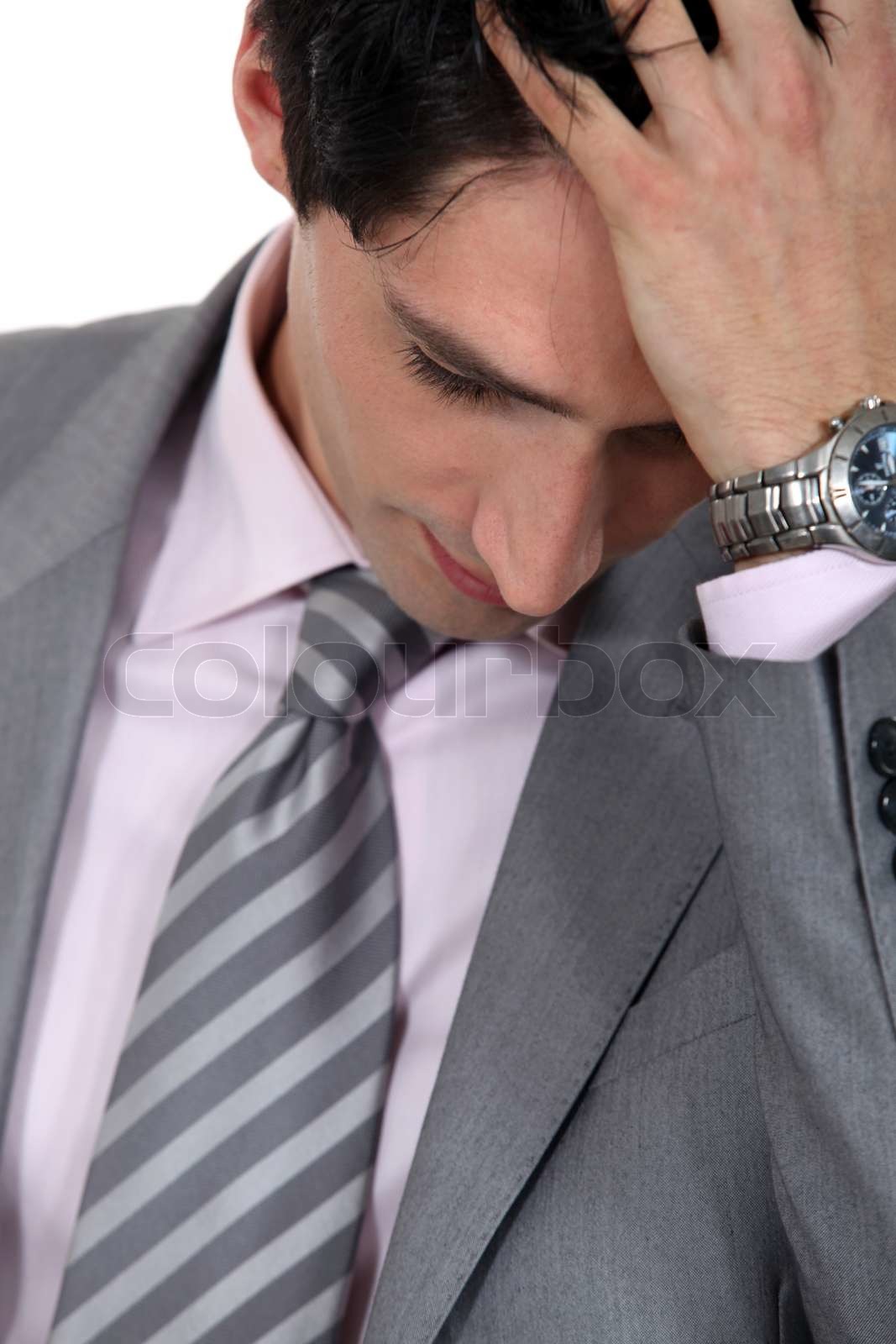 Businessman Running His Fingers Through His Hair Stock Image Colourbox